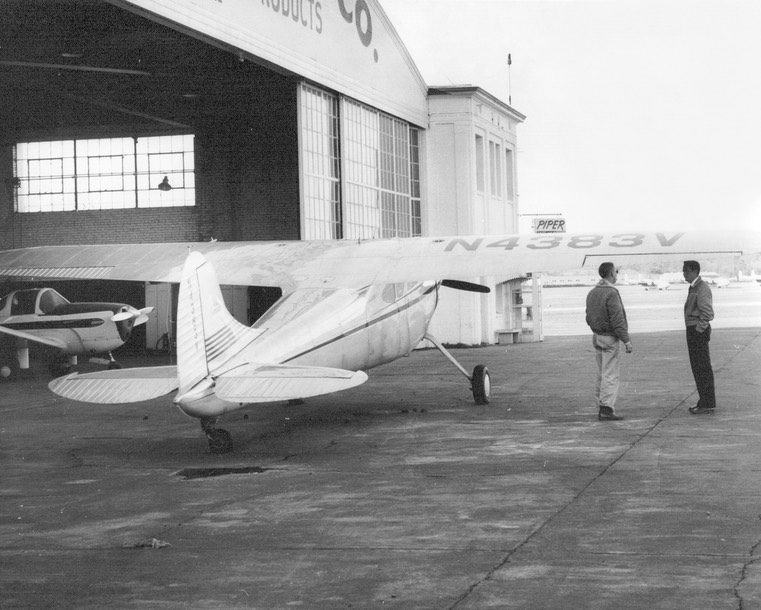 1955 - Tom's plane at hanger