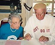 Rachel helps Carl Higdon at the registration desk for the 1991 HFA meeting