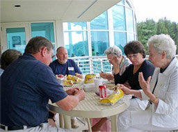 05 From left - Charles P. Higdon; William R. Higdon; Eva Wood; Delores Elliot (Eva's Friend); and Barbara Tedford having lunch on the patio of the research facility